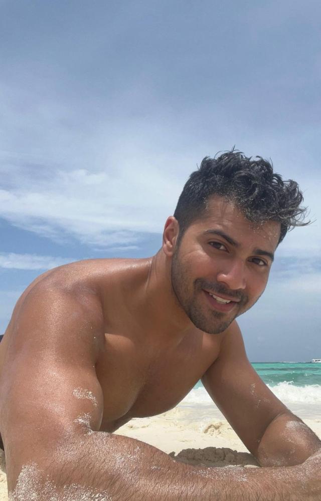 In this picture, Varun struck a charming pose, gracing the camera with an irresistibly cute smile that left everyone in awe
